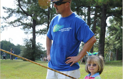 Dad watching a toddler