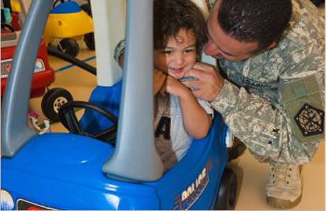 Dad playing with a toddler