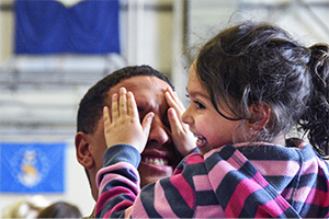 Child playing with dad