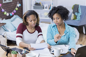 Mom and daughter working together